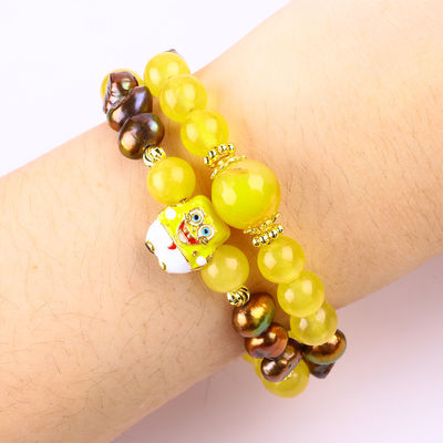 รักษาแท้ คริสตัลเหลืองแคลเซโดนีและกาแฟสีน้ําหวานเพชรกับ Spongebob การ์ตูน Charm แบรนเซล