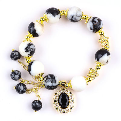 12 มิลลิเมตร สีดําและสีขาว Zebra Jasper การรักษาข้อมือข้อมือสําหรับสมาธิ