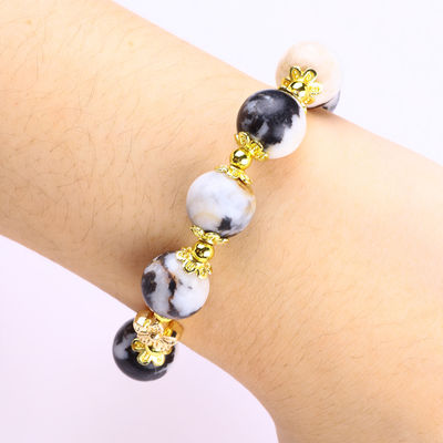 12 มิลลิเมตร สีดําและสีขาว Zebra Jasper การรักษาข้อมือข้อมือสําหรับสมาธิ