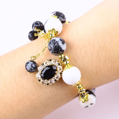 12 มิลลิเมตร สีดําและสีขาว Zebra Jasper การรักษาข้อมือข้อมือสําหรับสมาธิ