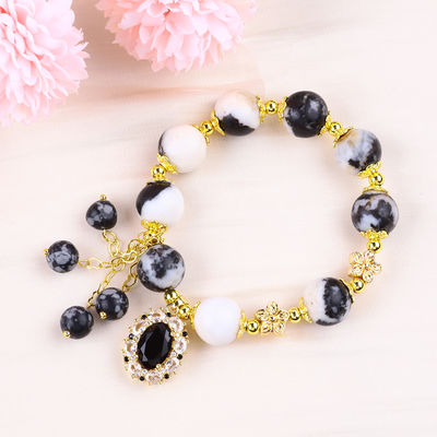 12 มิลลิเมตร สีดําและสีขาว Zebra Jasper การรักษาข้อมือข้อมือสําหรับสมาธิ