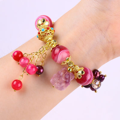 สร้อยข้อมือหินสีชมพู 14 มม.