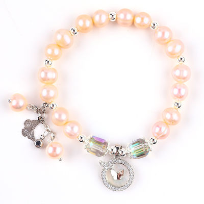 7 มิลลิเมตร สร้อยข้อมือสีชมพู Pearl Stretch With White Shell ยอมรับการปรับแต่ง