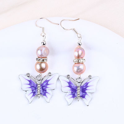 9 มม สีม่วง สีบารอค น้ําหวาน หูหูมุก กับความชื่นชอบของผีเสื้อ