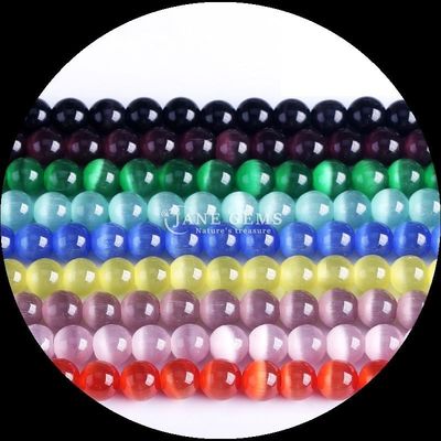 สีแดง สีน้ําเงิน สีม่วง สีขนมทรงกลม รูปทรงตาแมว สายขนมหลุด สําหรับพลังงานการรักษาและการให้ของขวัญ