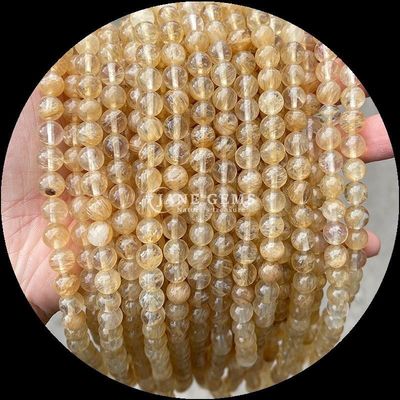 หินแท้เคลือบตัดกลม ไฟควาร์ทส ทอง Rutilated Quartz กลีบข้อมือสําหรับการทําเครื่องประดับ DIY